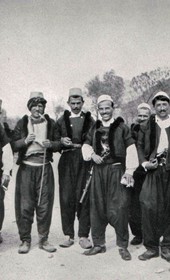 EVL059: Group of Albanian men smoking (Photo: Erich von Luckwald, ca. 1936).